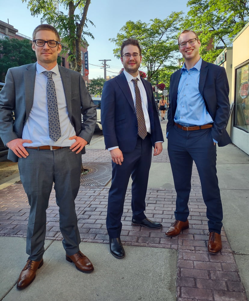 3 men in suit and ties outdoors taking a team photo for Legal Marketing Experts